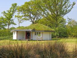 Roundhouse surrounded by greenery