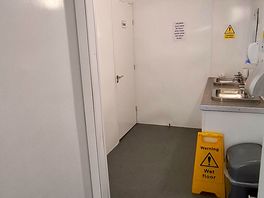 Ladies bathroom. shower, toilets and sinks.