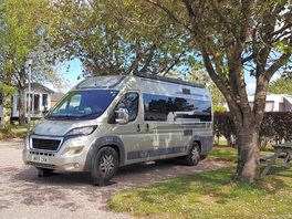 Campervan on hardstanding pitch.