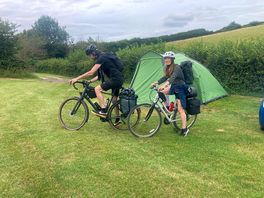 My daughter and boyfriend cycling to next campsite.