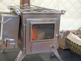 Log burner in the bell tent to keep us toasty warm!