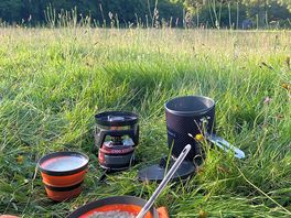 Camp site in middle of wild flower meadow.