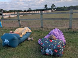 Chilling with the horses next to our tent