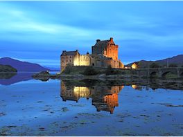 Eilean donan castle lit up.