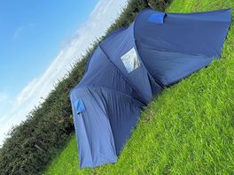 Our large tent, barely making a dent in the massive space provided