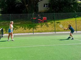 Tennis, basketball and football multi-use court.