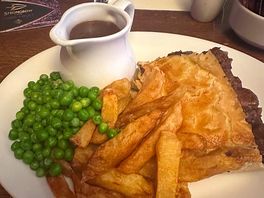 Steak pie and chips. gravy was outstanding flavour and consistency.