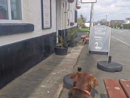 Dog friendly inside but also has a large rear beer garden.