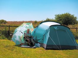 a large tent pitch means you have plenty of room to relax especially with a large umbrella!