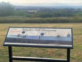 Information board informing of views to scotland and wales, on a good day