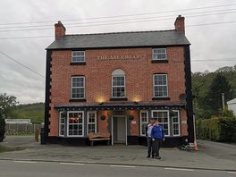 Abermule inn 4 minute easy stroll away from site.. reasonably priced drinks and food.