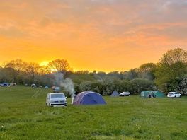 Visitor image of the camping field at sunset