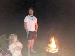 Enjoying a campside fire