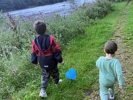 The walk to the river for the kids to use their nets