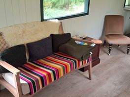 Zeus shepherd's hut 2 seater sofa in living area