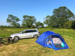 Pitch with tent