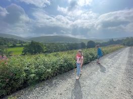 A fresh walk from the site to the nearby hills