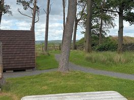 Each pod has a picnic bench at the side