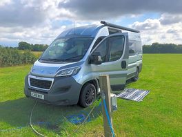 Electric grass pitch with water point