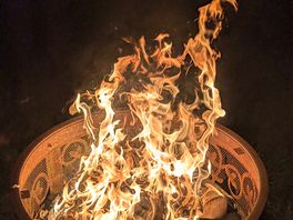 Our fire pit provided by the owner + logs