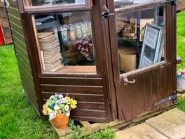 Hut selling produce from farm.