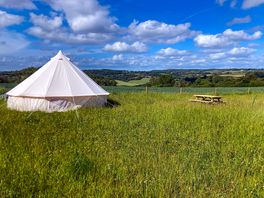 Bell tent with picnic table