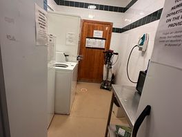 Washing facilities and communal fridge