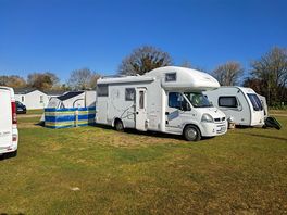 Van and tent very close.