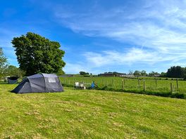 Non-electric grass tent pitch