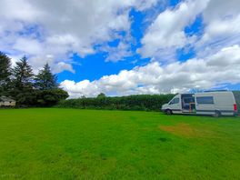 Camping field next to pub, a few vans and tents there over night with us