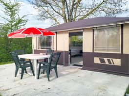 Private seating outside a rental tent
