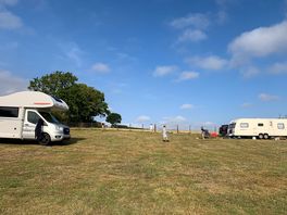 Kids playing on the campsite.
