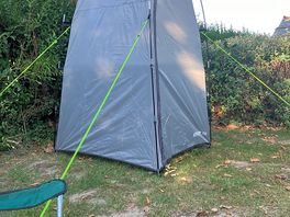 Utility tent in the corner.