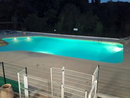 The pool at night time.