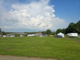 Spacious green area for football and pitches not too close