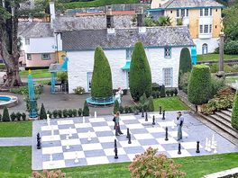 Playing chess in the village centre
