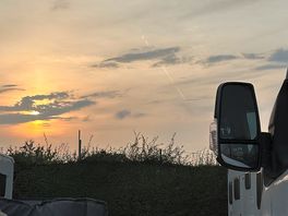 Sunset over kings green caravan park nr malvern