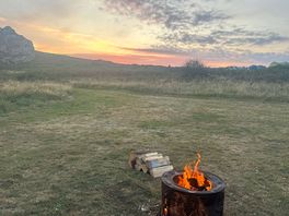 Fire pit supplied by the owner and table and chairs.