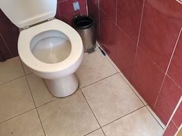 Toilet and stuff on the ground