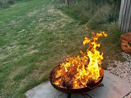 Lovely fire pit at night.
