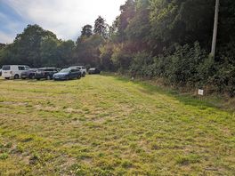 Pitch numbers round the edge of the campsite/carpark.