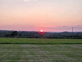 Sunset viewed from the tent field