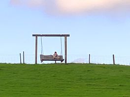 Giant wooden swing at the top of the hill on the campsite great for watching the sunset