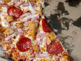Pepperoni pizza cooked by owners. took this photo quickly as it did not last long.