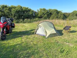 Flat tent pitch with plenty of space