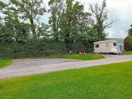 Hard-standing touring pitch with EHU and Awning