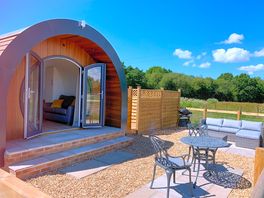 Beautiful secure garden with sofa, BBQ and table & chairs, overlooking the meadow