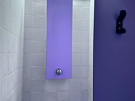 Unisex showers not that big or inviting