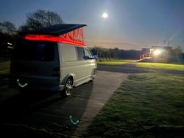 Green gates at night
