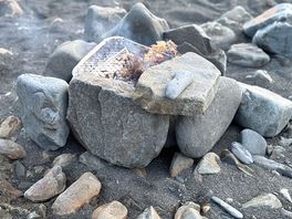 Toasting marshmallows on the beach